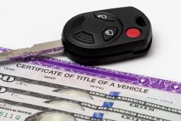 A car title, cash, and an ignition key.
